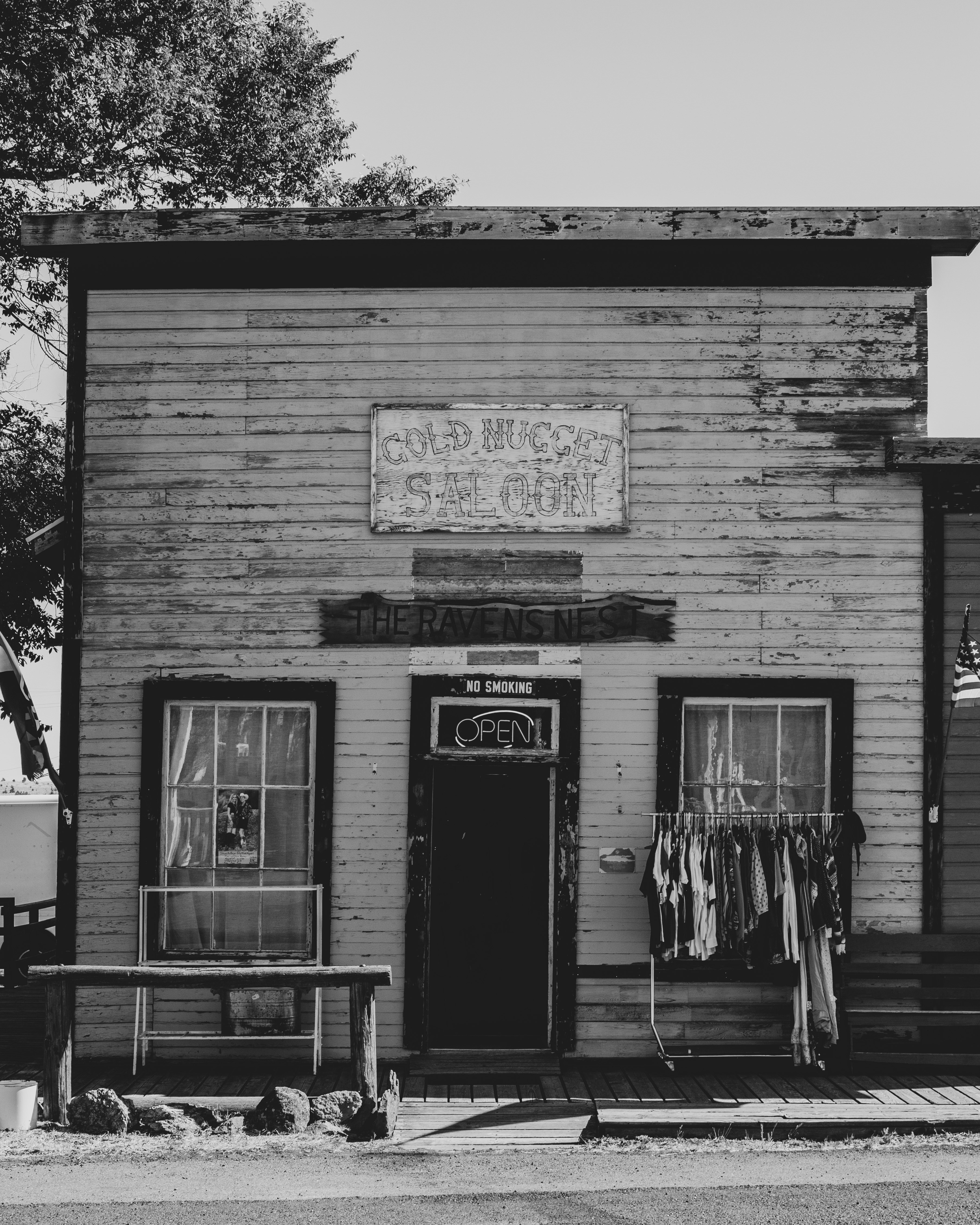 grayscale photo of store front